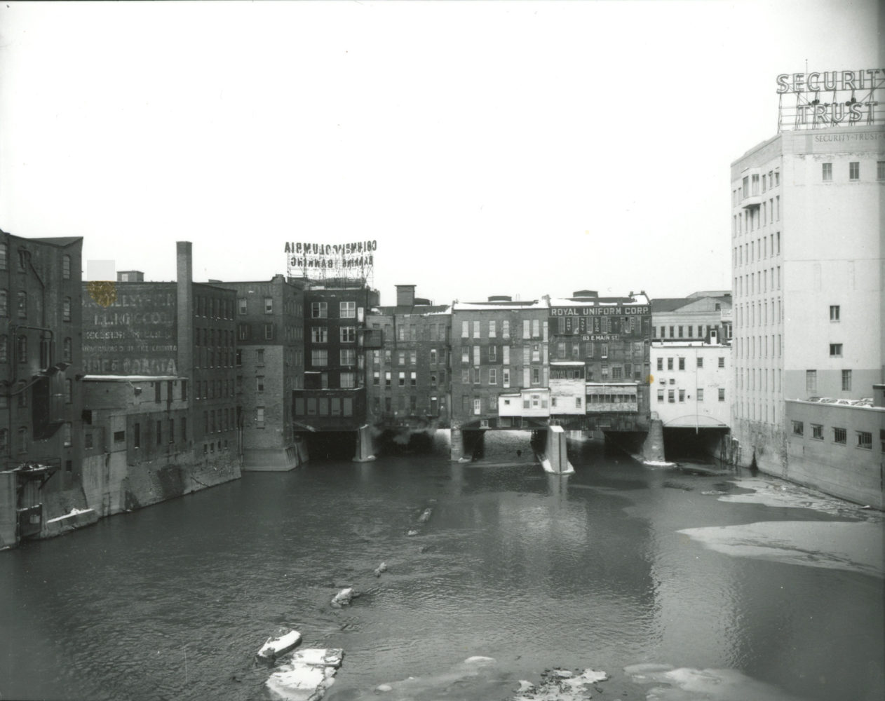 Buildings lining south side of Main Street bridge - photo from City of Rochester