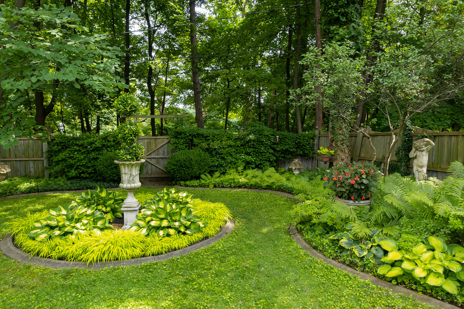 Backyard garden along Maplewood Avenue backs up to Genesee River gorge.