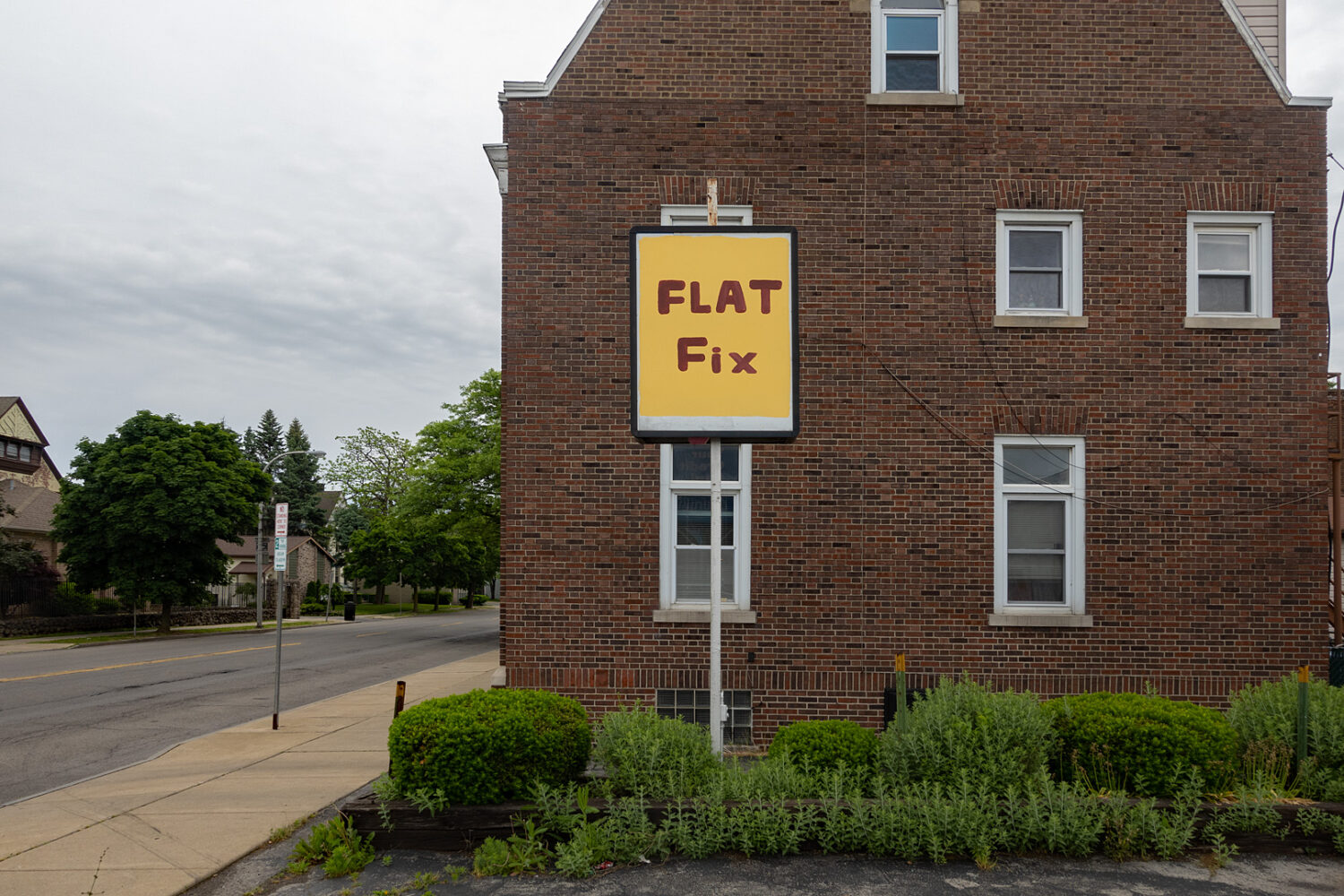 "Flat Fix" sign along Main Street in Niagara Falls