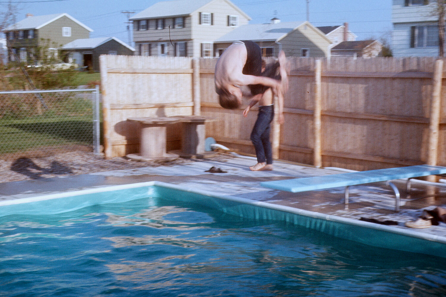 My brother, Fran, doing a flip off diving board with Brad Fox in 1968