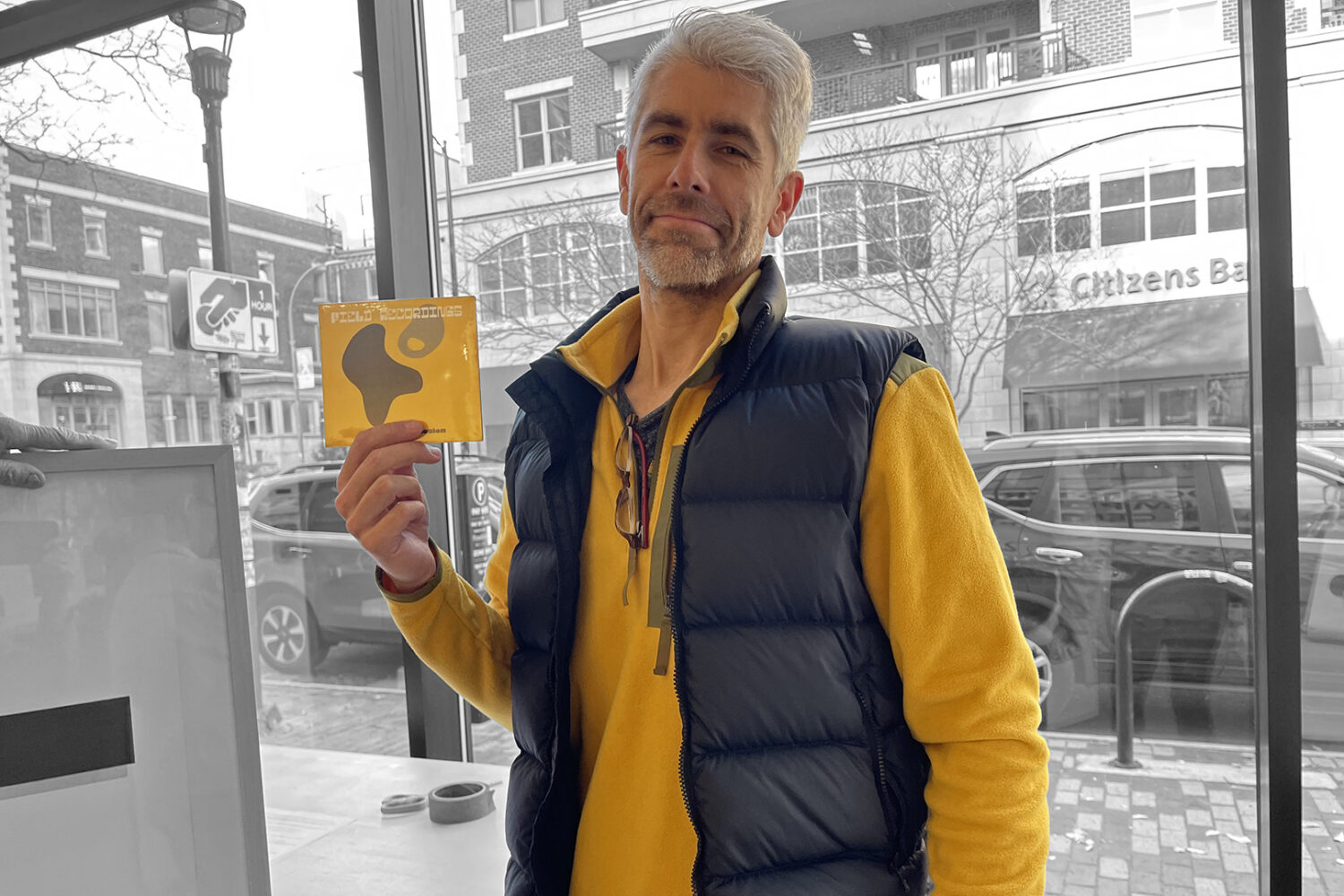 Rochester Contemporary Director, Bleu Cease, with copy of Margaret Explosion's new cd. Photo by Peggi Fournier.