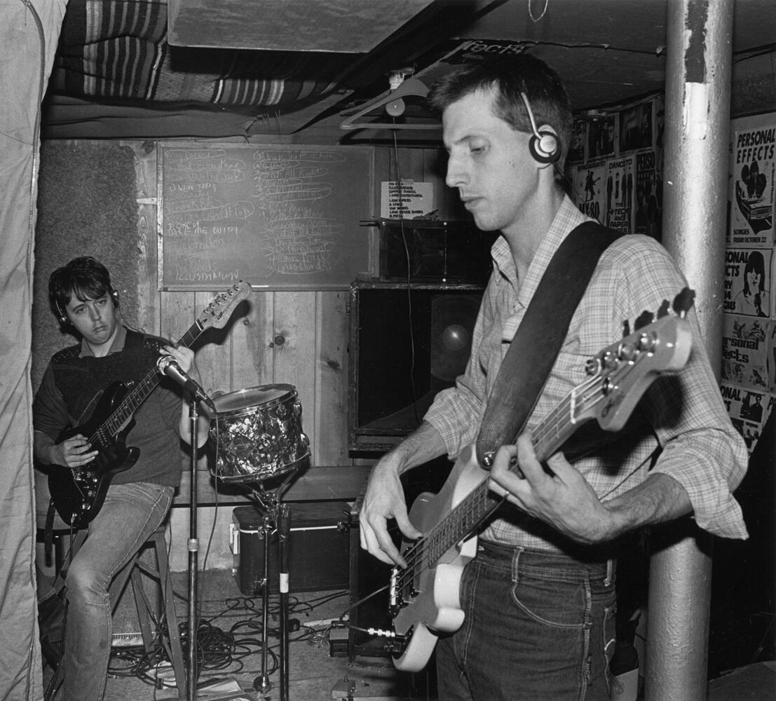 Bob Martin and Bernie Heveron playing guitar and bass for "This Is It" album 1983